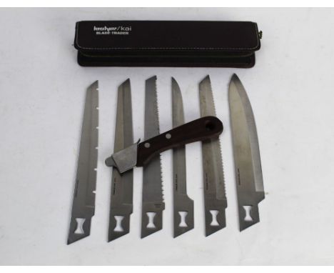 A Kershaw Kai Blade Trader knife with six different blades +/- 7" each.  This bladed product is not for sale to people under 
