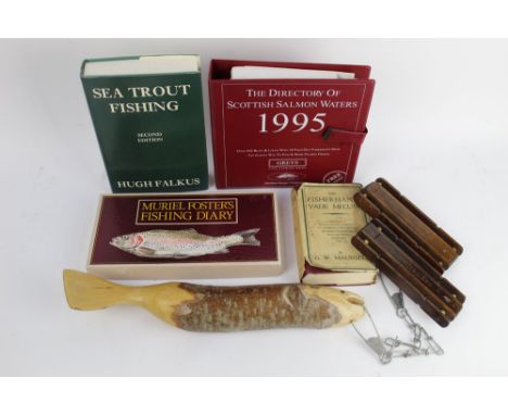 Four books, to include Sea Trout Fishing Second Edition by Hugh Falkus, together with a carved wooden fish and two vintage fi