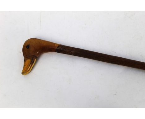 A walking stick with carved duck handle, length 107 cm