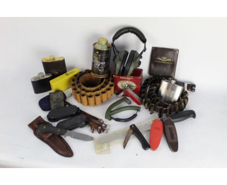 Box lot containing an Elkhunter fixed blade knife, overall length 21 cm and various other knives, shotgun cartridge belts, hi