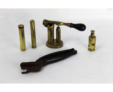Quantity of reloading and maintenance equipment, to include a Remington oil bottle, a military oil bottle stamped with broad 