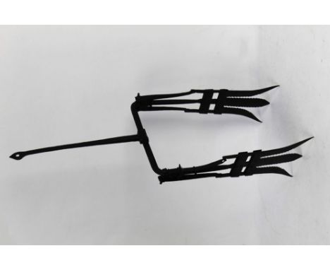 An unusual antique double eel fork, overall length 74 cm, width 26.5 cm, depth 16 cm.