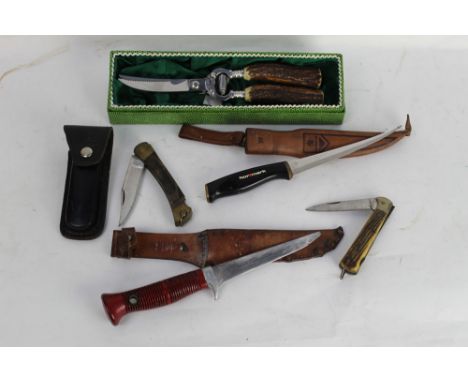 A Puma Mariner knife, Model 6362 (AF), together with a Normark Fiskars Finland filleting knife, two folding knives and a pair