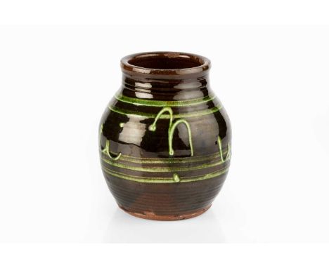 Ray Finch (1914-2012) at Winchcombe PotteryVaseslipware, with green fountain motifs on tenmoku groundimpressed potter's and p