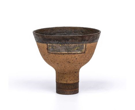 Robin Welch (1936-2019)Footed bowlstoneware, a textured orange glaze in between a manganese foot and rimimpressed potter's se
