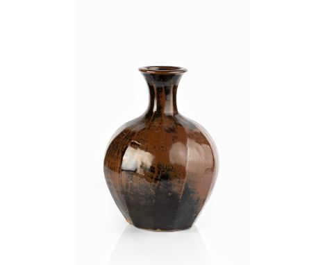 Trevor Corser (1938-2015) at Leach PotteryVasecut sides with tenmoku glazeimpressed potter's and pottery seals31cm high.  Pro