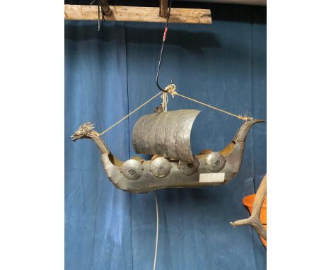 Mark Lloyd Riddell, a metal sculpture Viking longboat light fitting, inscribed with monogram and dated '95, 73 x 34cm Footnot