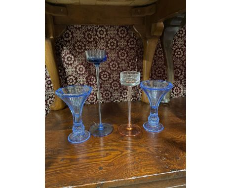 Two art glass Wedgwood candle sticks by Frank Thrower together with a pair of blue art deco glass candle stick vases. 