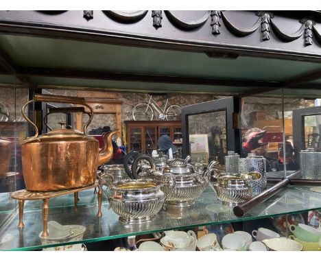 A Three piece E.P Tea Service, Victorian rolling ruler, Pewter hip flask, Copper kettle and stand/ trivet stand. 