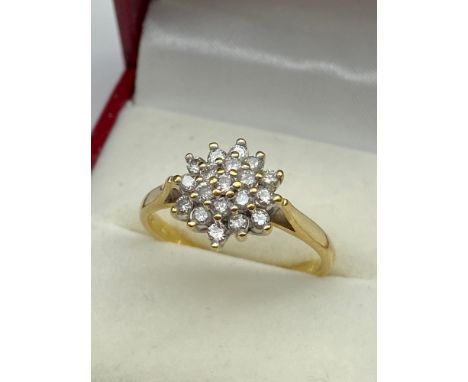 A Lovely example of a ladies 18ct gold and diamond cluster ring. [0.50ct of diamond], [Ring size Q] &amp; [3.6grams] 