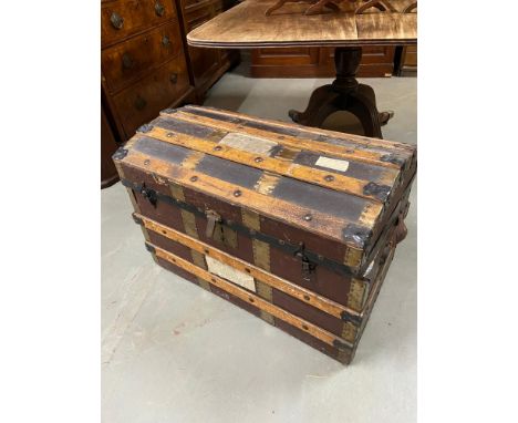 An antique steamer trunk designed with wood and brass bounds. [50X75X48CM] 