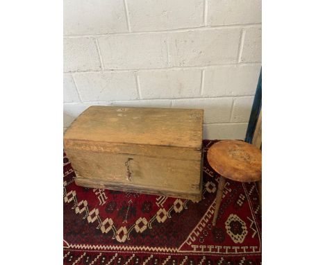 Antique pine dome top trunk together with a poker work milking stool. 