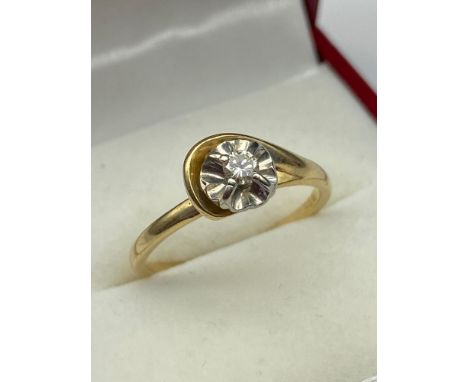 An 18ct gold ladies single diamond stone ring. [Ring size N] &amp; [2.30Grams] 