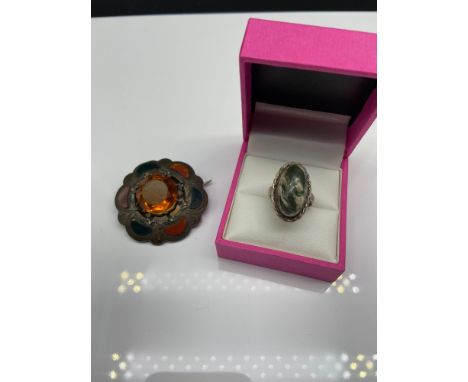 An Edinburgh silver and agate ring, together with a white metal, agate and citrine Scottish Brooch. 
