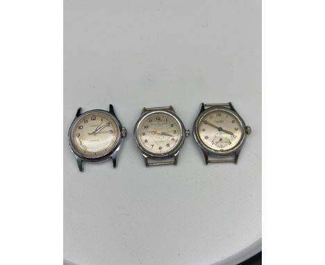 Three Vintage Gent's watchs to include Timex waterproof [U.S. Time Corporation], Girard- Perregaux 17 jewels waterproof and E