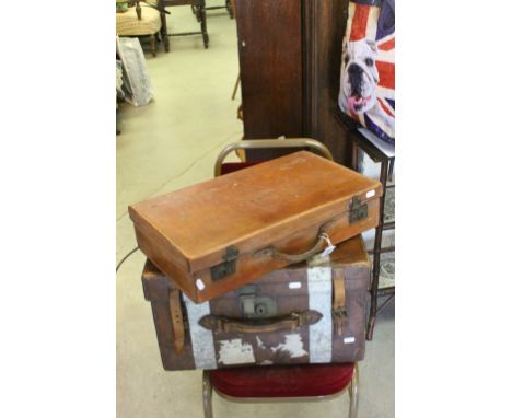 A vintage leather travelling trunk and a similar attache case.