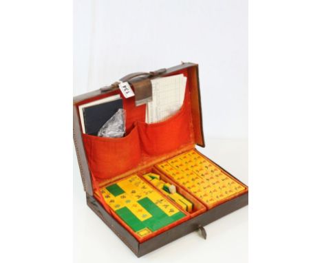 Vintage Leather Cased Mahjong Set, the clasp stamped Dakwanhwa together with Four Wooden Stands