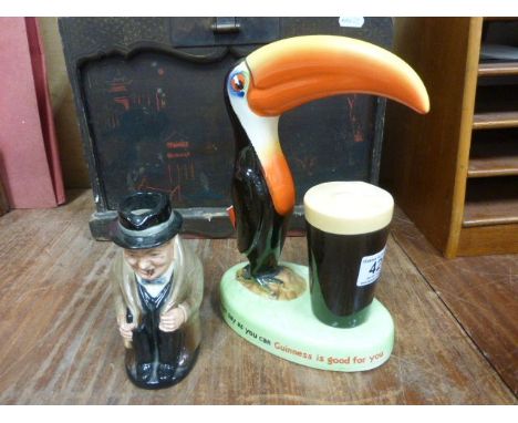 A vintage Guiness Toucan lamp af ,Winstone Churchill character jug and two plates.