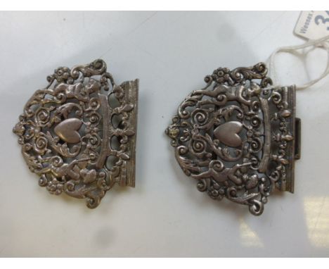 Vintage White Metal Nurses Buckle with Pierced Decoration in the form of Cherubs surrounding Hearts, makers mark for Alfred H