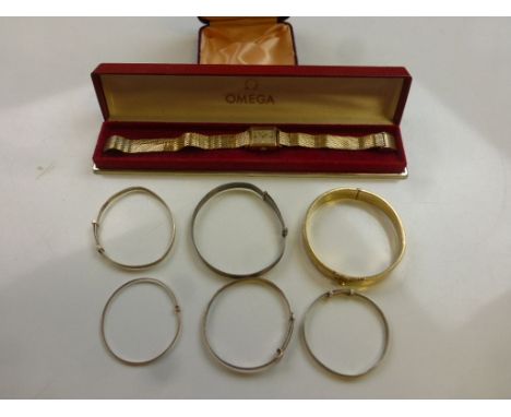 Ladies Omega Gold Plated Wristwatch in Case together with Child's Silver Bangles, Rolled Gold Bangle and another