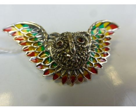 A sterling silver Plique a jour brooch in the form of an owl with ruby eyes 