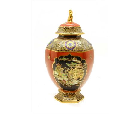 A Carltonware Chinoiserie vase and cover, the domed hexagonal top with gilt lion finial, the body decorated with cartouches o