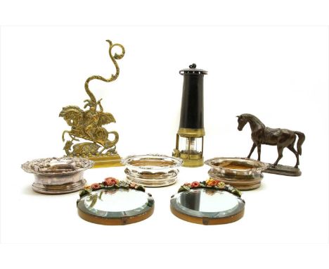 A cast model of a horse, 10cm high, together with a brass doorstop, three silver plated coasters, a pair of Borello design mi