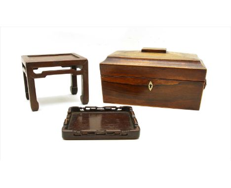 A Georgian rosewood tea caddy , together with two oriental wooden stands (3)