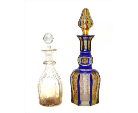 A 19th century blue and amber flush decanter, and one other