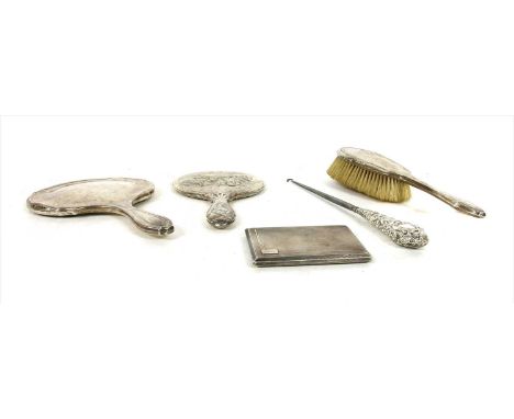 Silver items , comprising: an 'Art Deco' engine turned silver cigarette case, a Reynolds 'angel's head' dressing mirror, anot