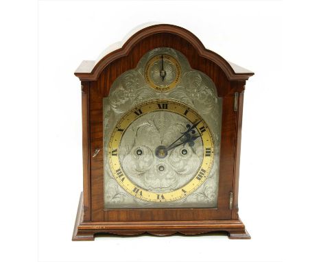 A Georgian style mahogany cased mantel clock, Goldsmiths and Silversmiths Co Ltd to dial, with Westminster movement and silve