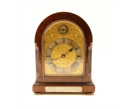 Walnut mantle clock with silver presentation plaque and feet