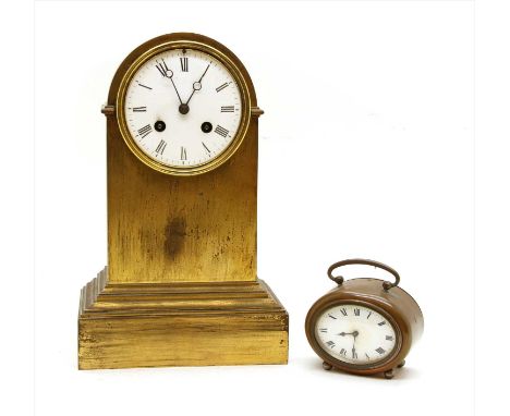 A 19th century gilt metal cased eight day mantel clock, the white enamel dial with Roman numerals and bell strike movement, 2