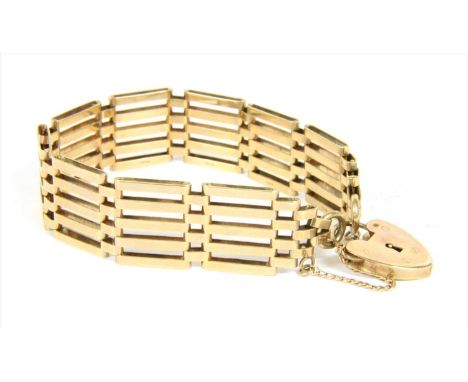 A 9ct gold five row gate bracelet, with heart shaped padlock clasp and safety chain, London 1968, 17.52g
