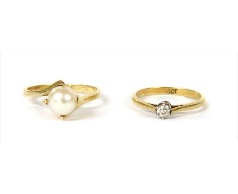 A gold cultured pearl ring, with a single cultured pearl, 7.2mm in size, four talon claw set at the compass points, to crosso