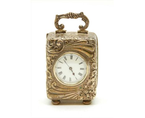 An Edwardian silver carriage clock by A &amp; J Zimmerman Ltd, Birmingham 1901, with foliate decoration, 7.5cm high