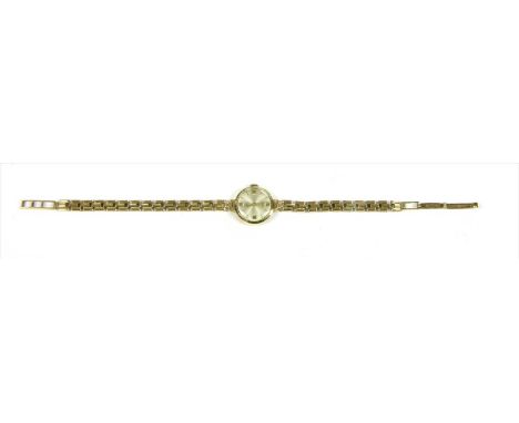 A ladies' 9ct gold Verity mechanical bracelet watch, 18mm diameter with a silvered dial, gilt baton hour markers, case no. 18