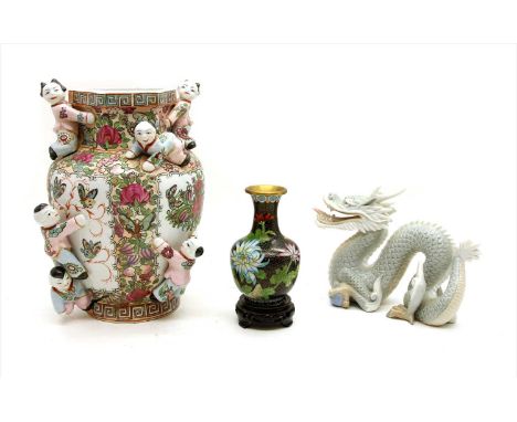 A Chinese famille rose fertility vase, together with a smaller cloisonné vase on associated wooden stand and ceramic model of