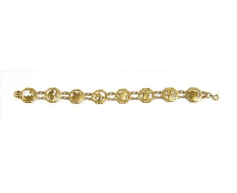 An Egyptian gold bracelet, with openwork octagonal panel links, variously depicting Pharaohs, Ankh crosses, pyramids, Lotus f