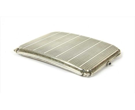 A sterling silver cigarette case, retailed by Selfridges &amp; Co., of curved form with engine turned decoration, cabochon sa