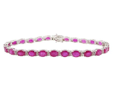 18ct white gold oval ruby and diamond bracelet, total ruby weight approx 9.15 caratCondition Report:Approx 9.9gm, length = 17
