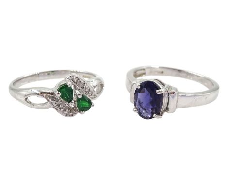 White gold single stone iolite ring, iolite approx 0.70 carat and a white gold tsavorite and diamond ring, both hallmarked 9c