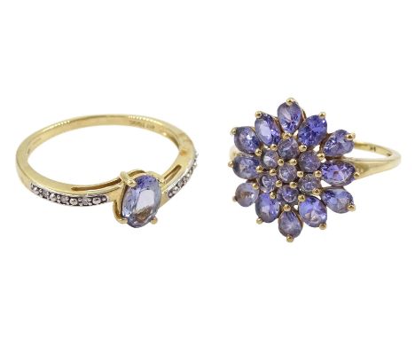 Gold tanzanite ring, with diamond set shoulders and a gold tanzanite cluster ring, both hallmarked 9ctCondition Report:Approx