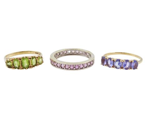 Gold five stone tanzanite ring, white gold pink sapphire full eternity ring and a five stone peridot ring, all hallmarked 9ct