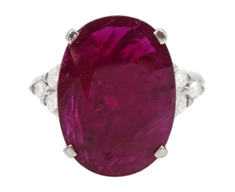 18ct white gold oval cut ruby and round brilliant cut diamond ring, ruby approx 8.60 caratCondition Report:Approx 6.5gm, size