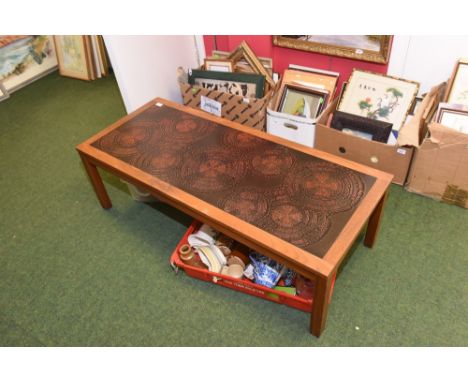 A 1970's tile topped coffee table