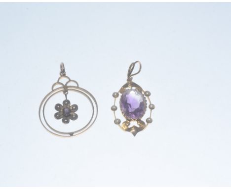 Two Edwardian amethyst and seed pearl pendants mounted in yellow metal