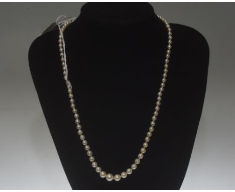 A single strand graduated cultured pearl necklace, on a pearl-mounted silver clasp. Length c. 47cm