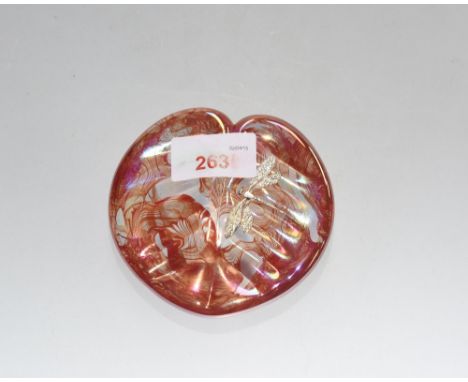 A glass lily paperweight applied with a white metal dragon fly, signed K. Heaton