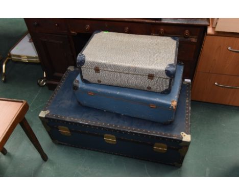 A vintage steamer trunk; tog. with two vintage suitcases